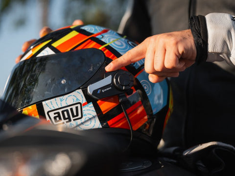 How do bikers communicate while riding?